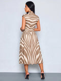 Back view of apricot and white zebra print belted midi dress with sleeveless A-line silhouette and back zipper