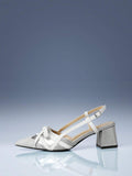 Cream textured toe pump with black laces and buckle strap