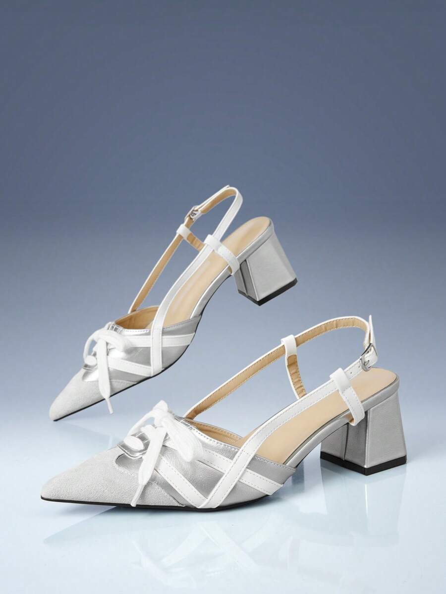 Cream and black colorblock pointed toe slingback pump