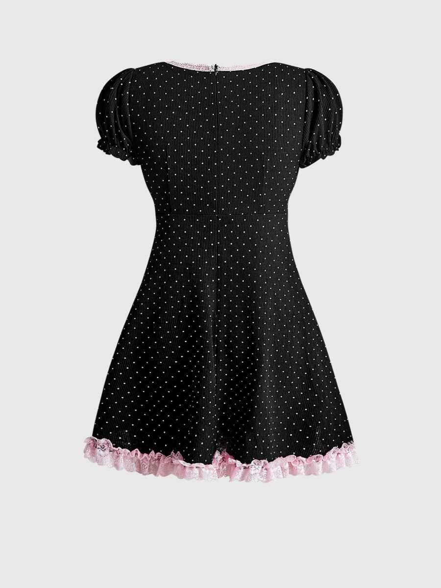 Back view of black polka dot puff sleeve mini dress with pink lace hem trim
