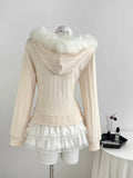 Back view of ivory cable-knit hooded jacket with white faux-fur trim