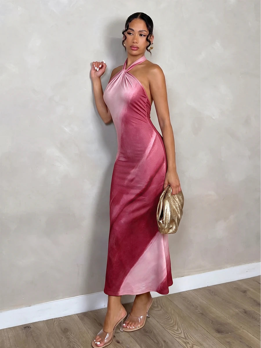 Angled front view of pink burgundy tie-dye twisted halter mermaid dress