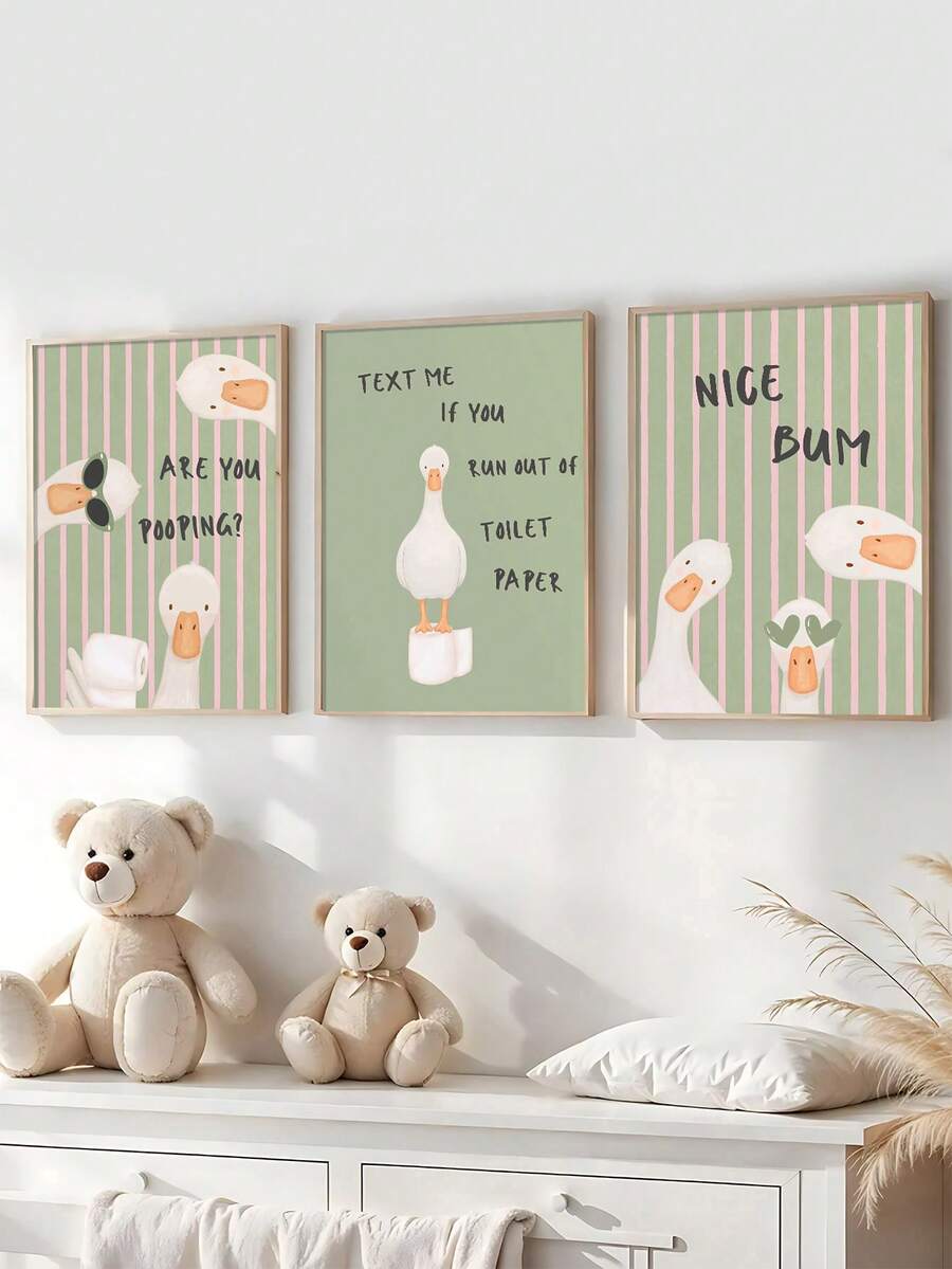 Set of three funny goose canvas wall art prints with pastel stripes above a dresser