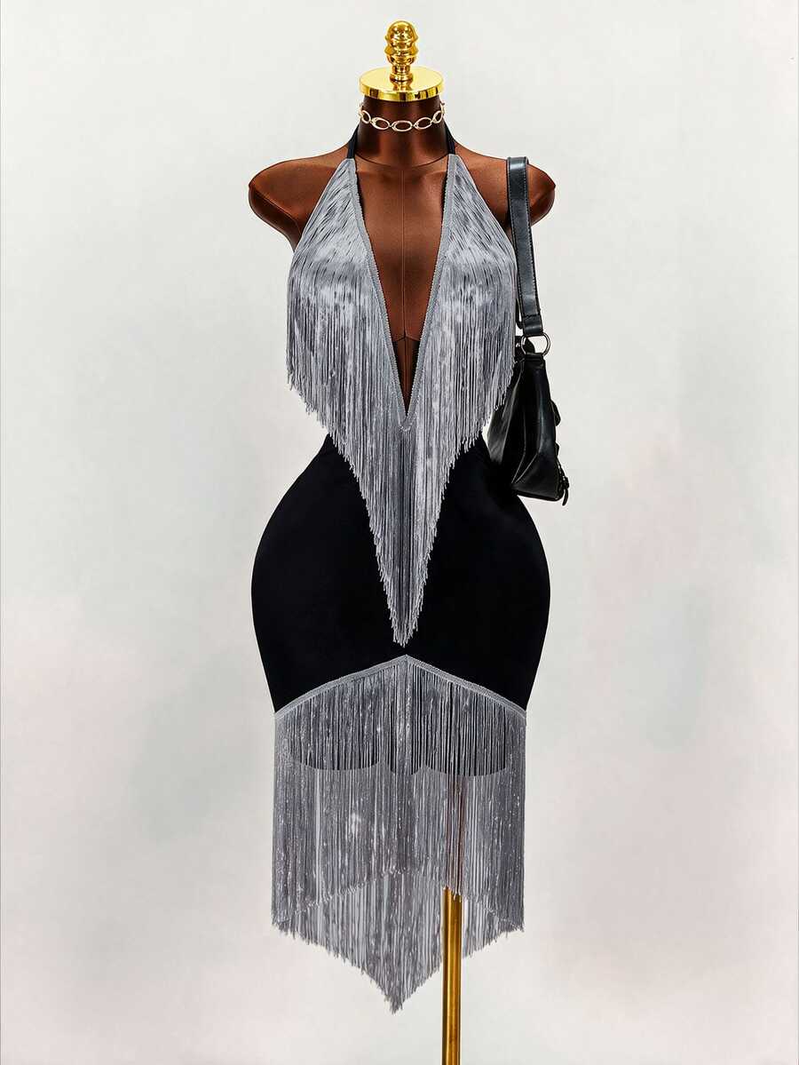 Front mannequin view of black halter cocktail dress with silver fringe bodice and asymmetric fringe hem