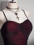 Close-up of ruched sweetheart bodice on burgundy and black gothic vampire dress