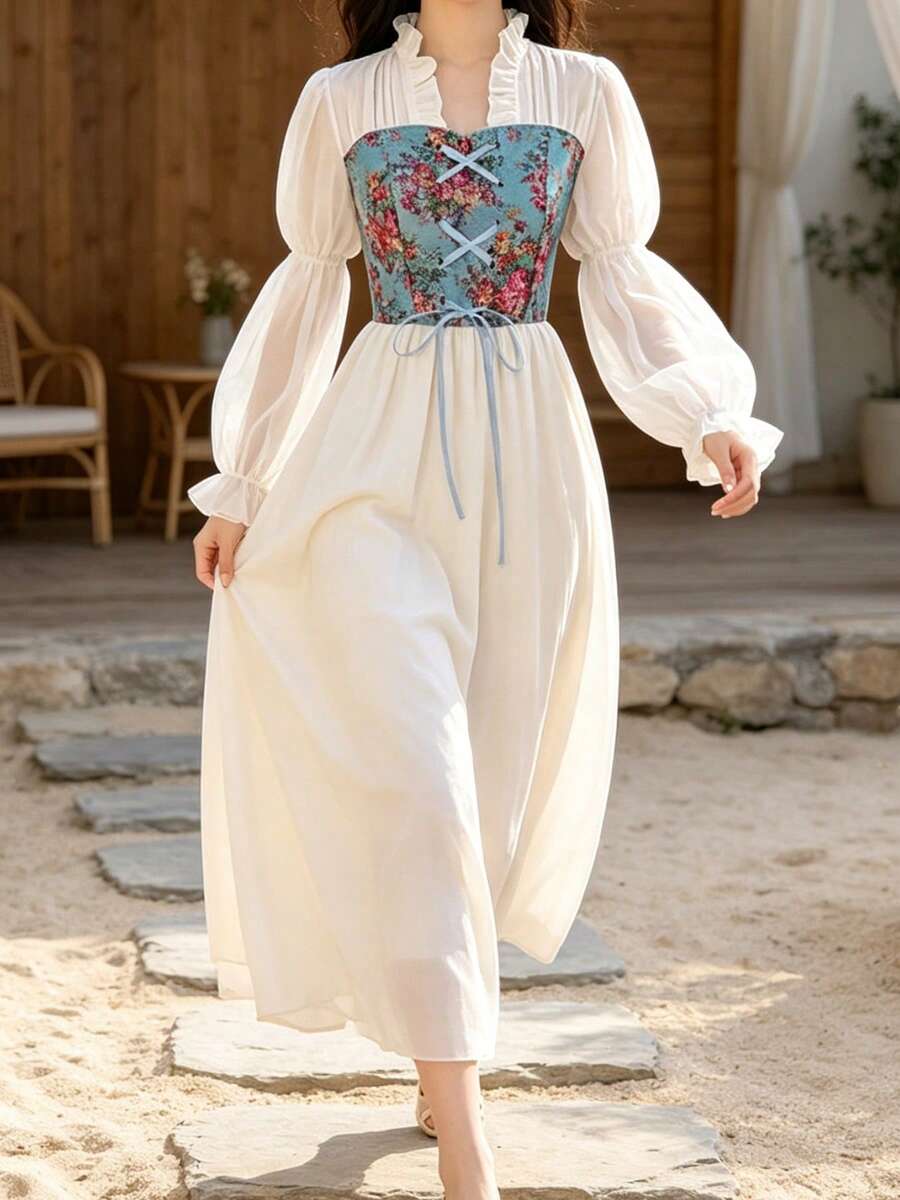 Front view of blue floral corset renaissance maxi dress with ivory skirt