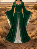 Front view of deep green medieval maxi dress with white underlayer and cord trim