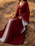 Seated front view of burgundy Renaissance A-line gown with square neckline and cord trim