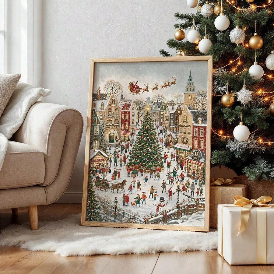 Light wood framed Christmas village canvas leaning beside a decorated tree and gift box