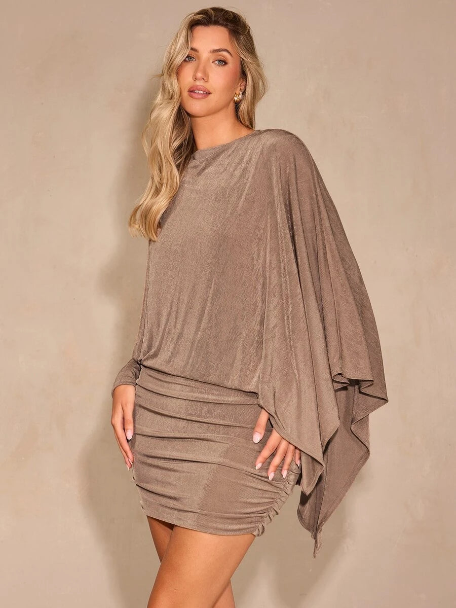 Three-quarter view of mocha brown ruched mini dress with flowing asymmetric sleeve