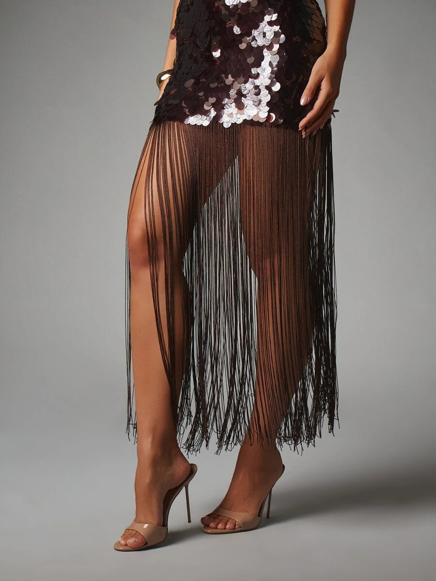 Detail of long coffee-brown fringe strands beneath the sequin dress panel