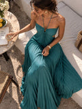 Light blue pleated open-back maxi dress with tie closure, rear view