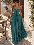 Turquoise pleated halter maxi dress with flowing skirt detail