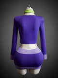 Back view of purple long-sleeve crop top and fitted mini skirt costume set with green scarf