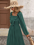 Close front view of dark green ruffled square-neck bodice and bishop sleeve