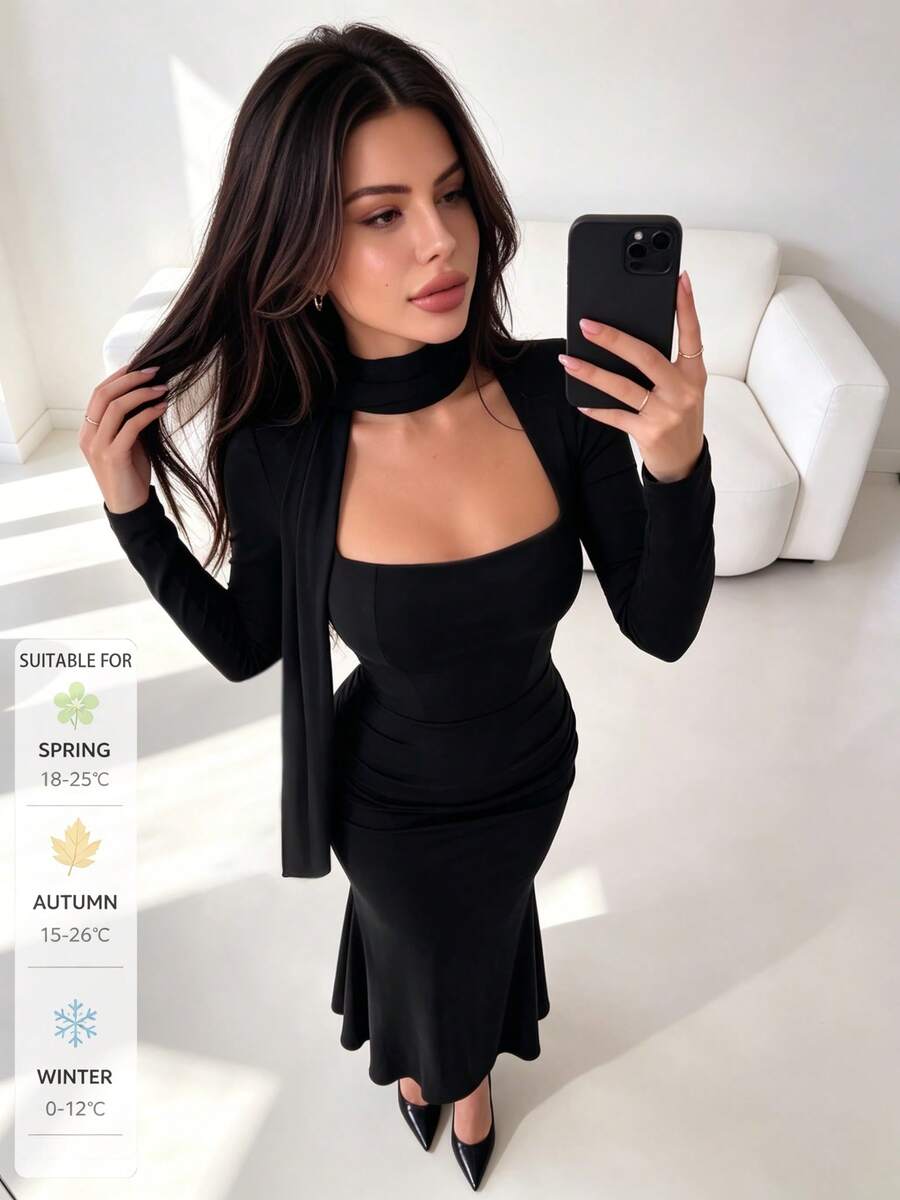 Close front view of black long sleeve square-neck dress with ruched waist