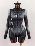 Mannequin front view of black gray web graphic stand-collar romper