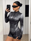 Front view of black gray web graphic romper with spider chest motif