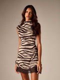 Front portrait showing mock neckline and black-and-ivory stripes on lace-trim dress
