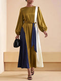 Full front view of belted colorblock maxi dress with long sleeves and round neckline