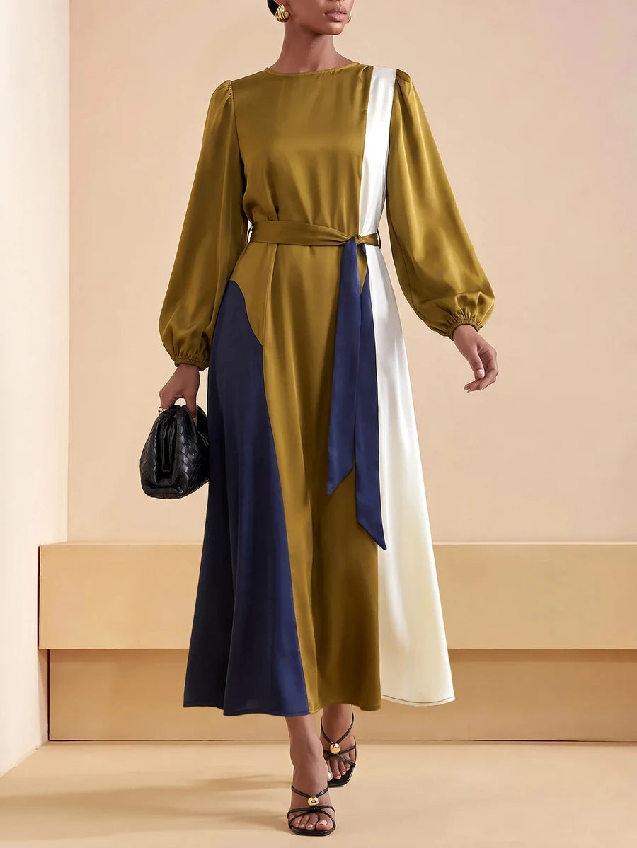 Full front view of belted colorblock maxi dress with long sleeves and round neckline