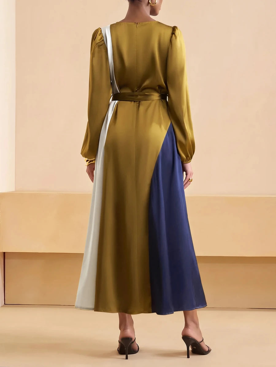 Rear view of long colorblock dress showing belt and vertical panels