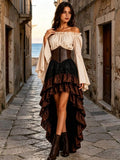 Frontal view of apricot off-shoulder blouse with corset and tiered black burgundy skirt