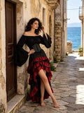 Black Victorian-inspired off-shoulder dress with corset-style waist and red-black high-low ruffles