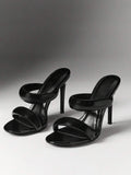 Pair of black patent double-strap high-heel mules with open toes