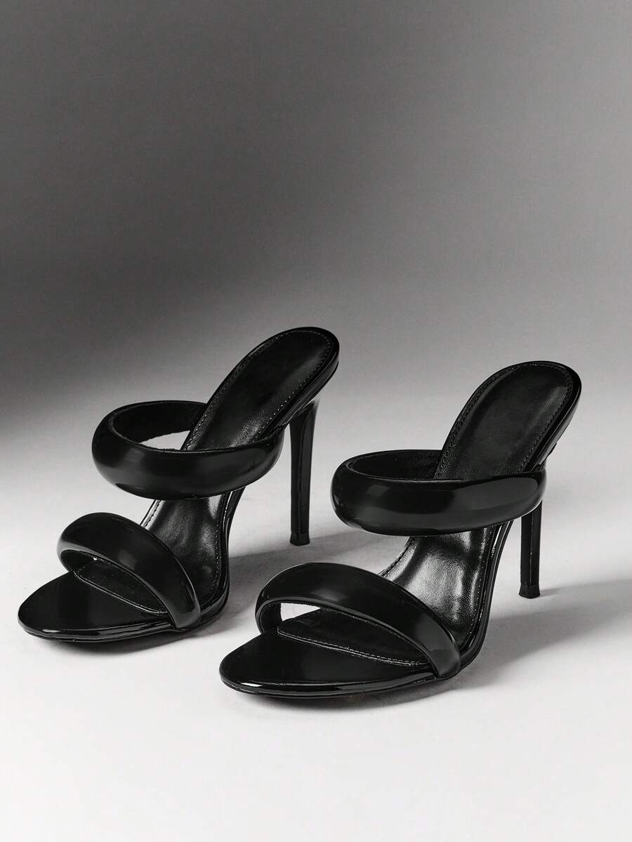 Pair of black patent double-strap high-heel mules with open toes