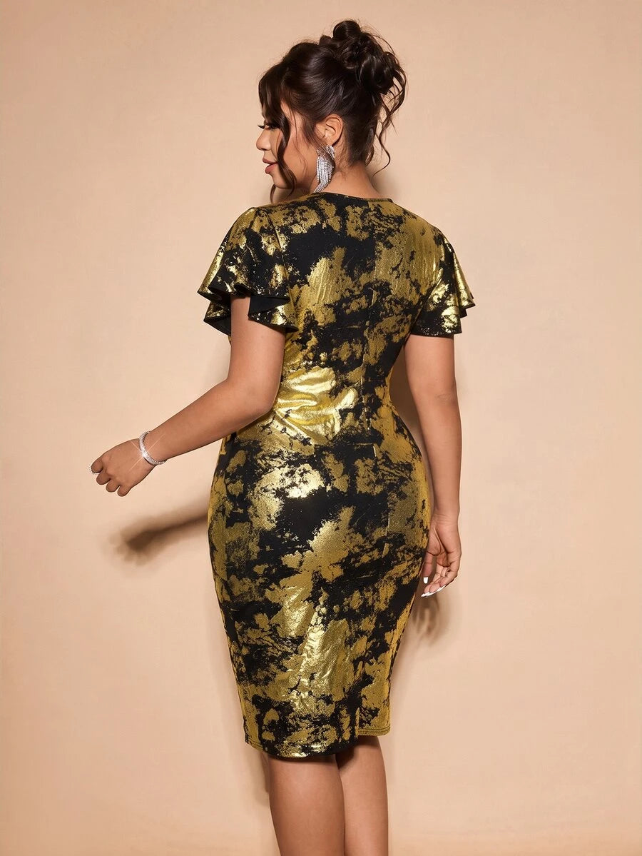 Back view showing the fitted silhouette and flutter sleeves of a black and gold dress