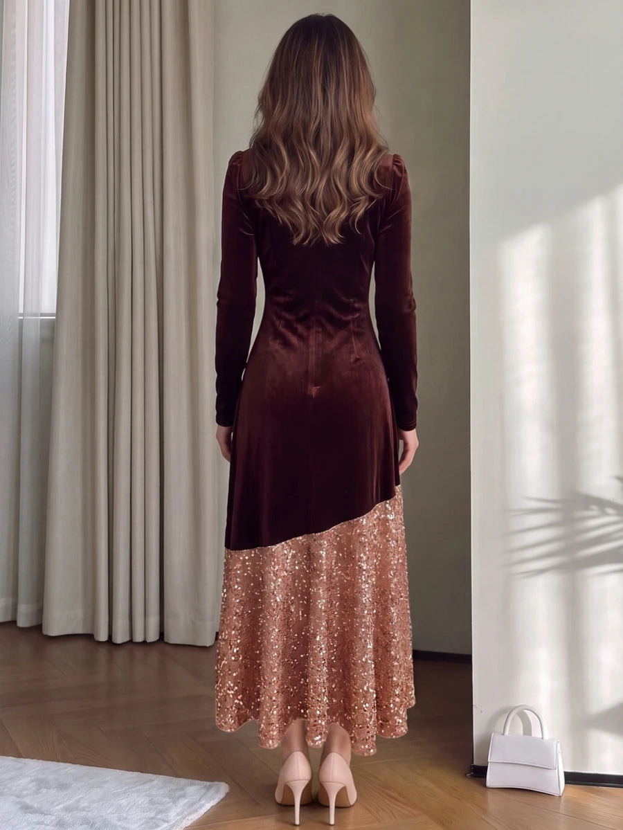 Front view of long-sleeve burgundy velvet dress with angled sequin hem and evening clutch
