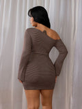 Rear view of the striped knit mini dress showing its fitted back and one-shoulder neckline