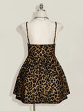 Back view of leopard-print cami dress showing slim straps and gathered flared skirt