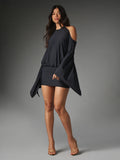 Three-quarter full-body view of black halter mini dress with dramatic cape sleeves and fitted asymmetrical skirt