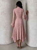 Rear view of the dusty-rose lace dress showing its fitted waist, back closure and uneven hem.
