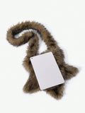 Close view of brown faux-fur star bag and strap with a small metal eyelet detail
