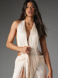 Close-up front view of ivory satin plunging halter neckline with fine fringe trim