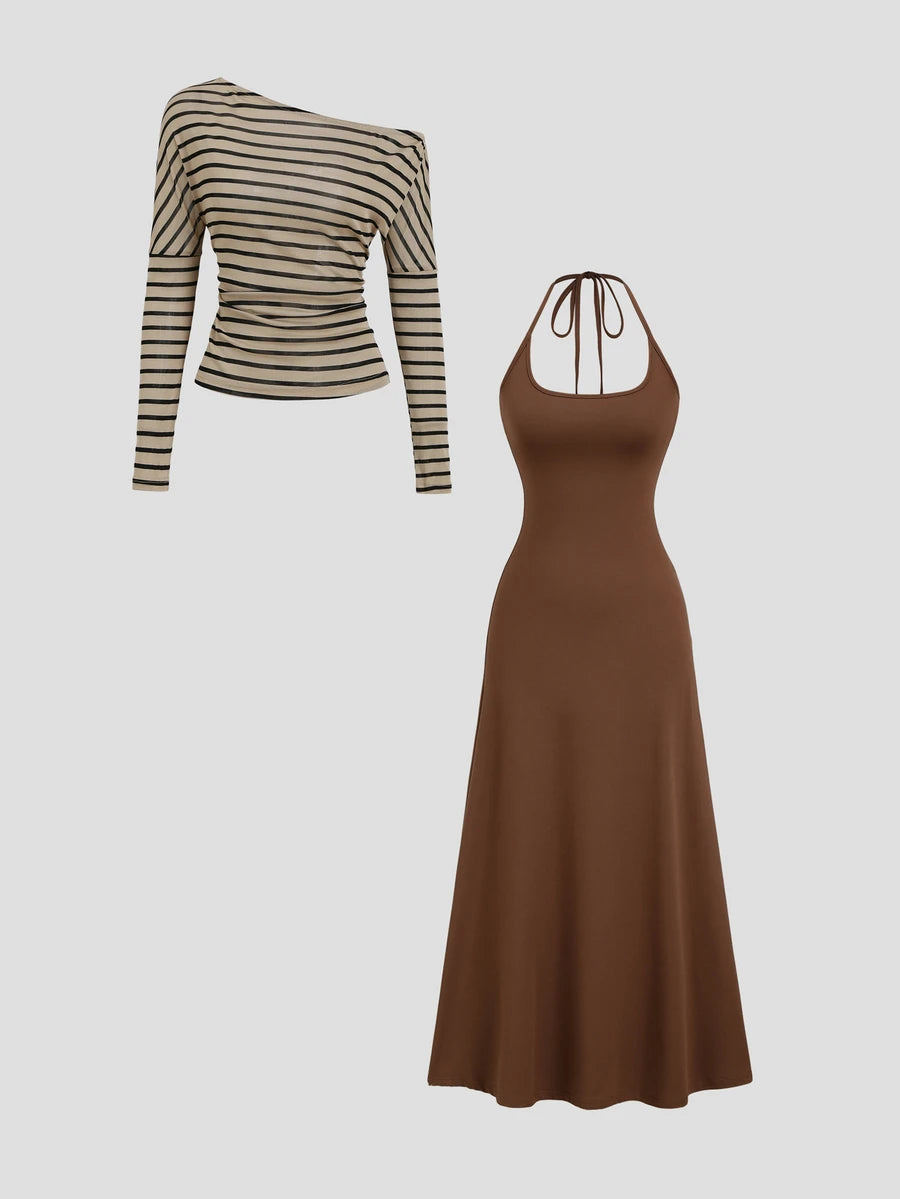 Front view of brown halter midi dress layered under beige and black striped asymmetric long-sleeve top for coordinated outfit styling