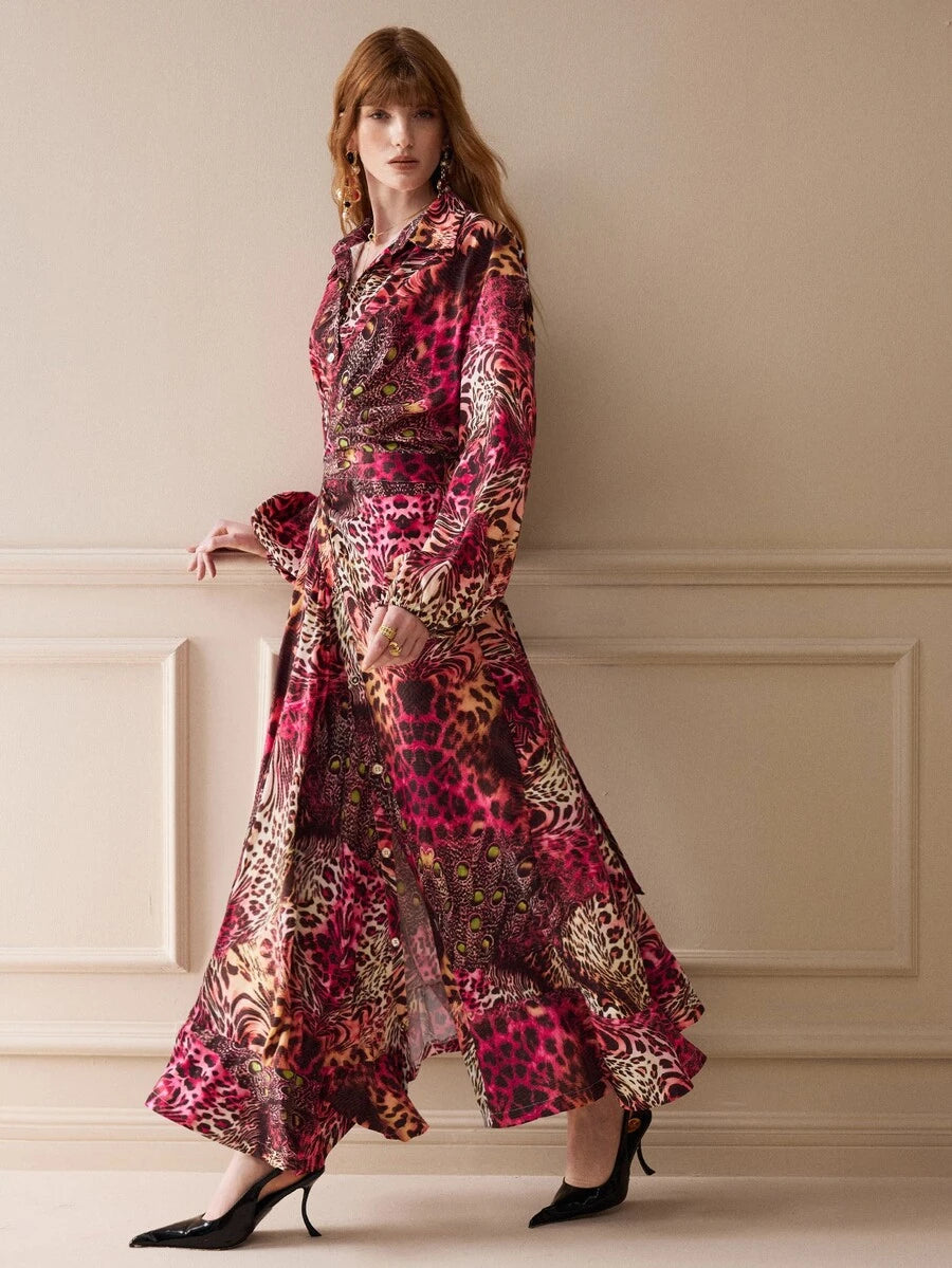Full-length side view of the flowing multicolor animal-print dress with high waist and slit hem.