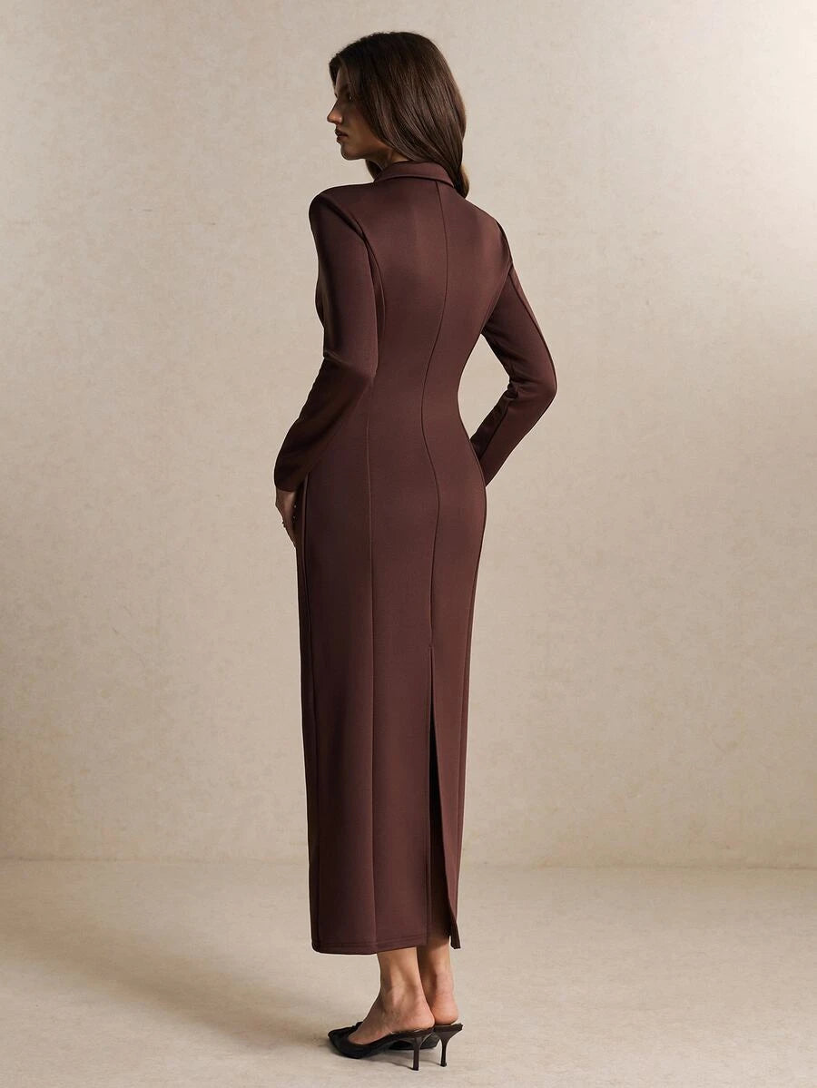 Back view of the chocolate brown long-sleeve fitted dress showing collar, contoured seams, straight ankle-length skirt, and back slit