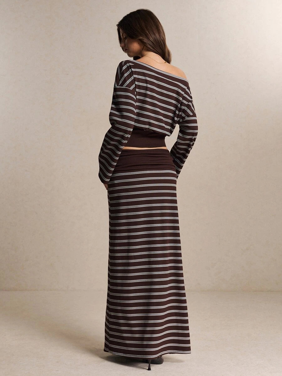 Front view of brown striped off-shoulder crop top and matching long skirt outfit set