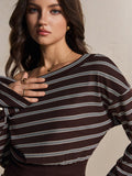 Close-up of brown rib-knit-look top with pale stripes and wide off-shoulder neckline