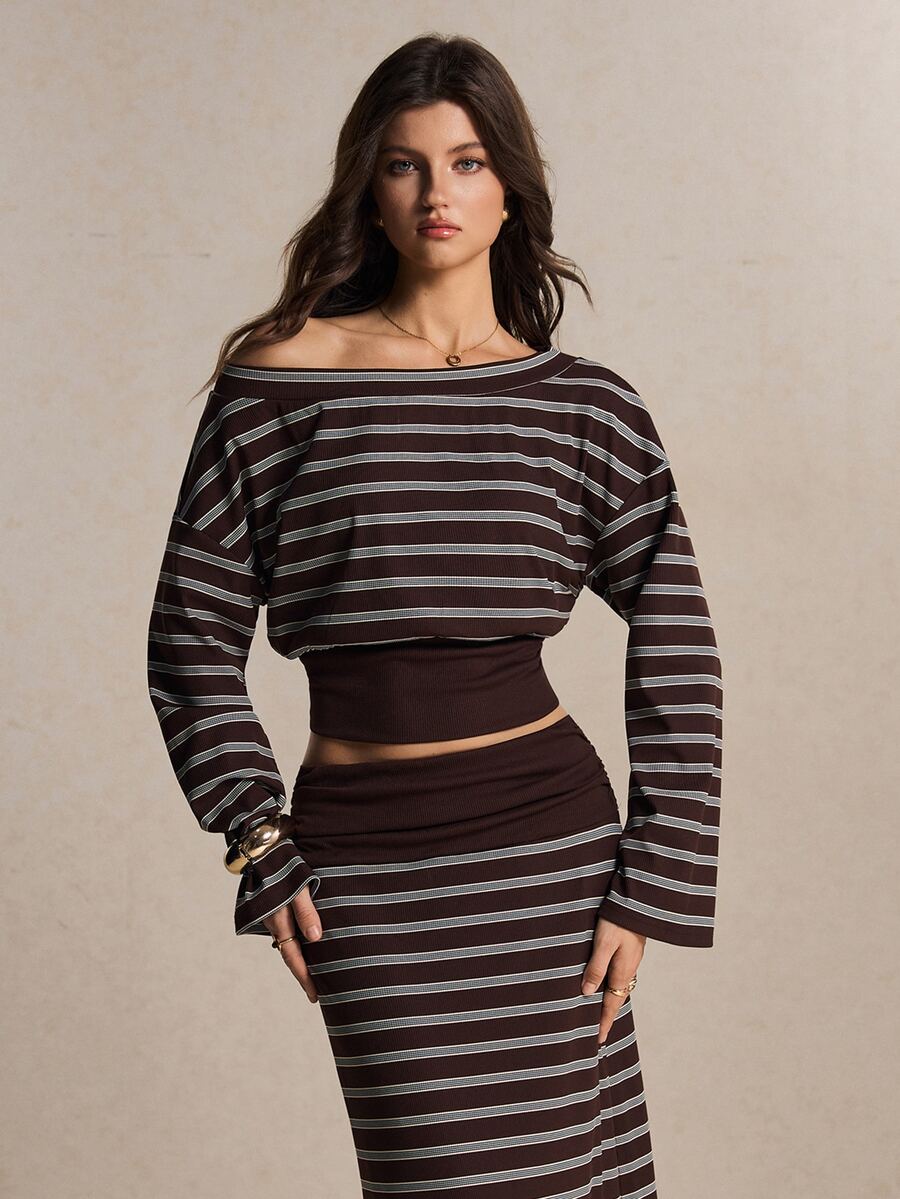 Front detail view of brown striped off-shoulder top with flared sleeves and matching skirt