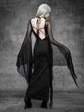 Back view of black mesh sleeve maxi dress with open tie-back detail
