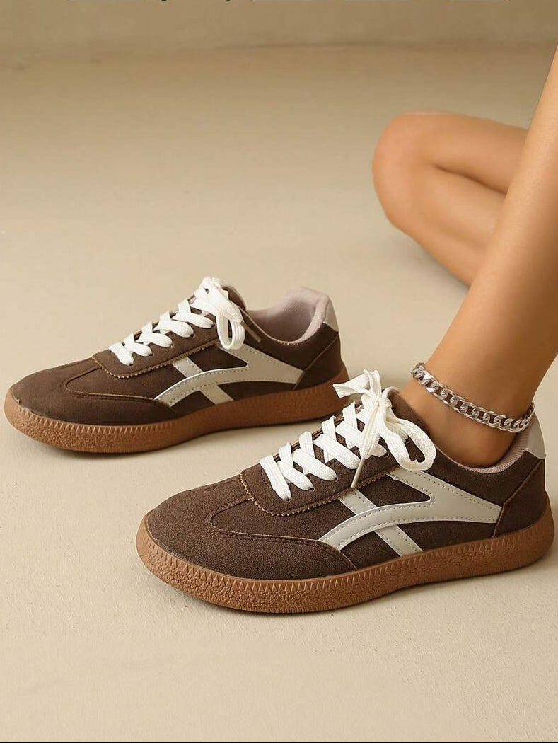 Designed for everyday versatility, these lightweight women's sneakers deliver comfort whether you're hitting the gym, taking a casual stroll, or cruising on a skateboard. The breathable construction keeps your feet cool during active pursuits, while the cushioned sole provides support for all-day wear. The sleek, minimalist design pairs effortlessly with any casual outfit, making these shoes a go-to choice for fitness enthusiasts and style-conscious wearers alike.