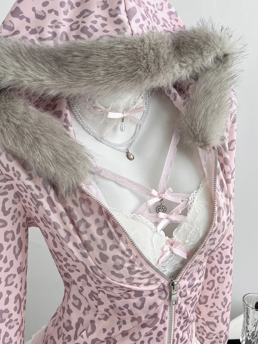 Close detail of pink leopard faux-fur trimmed zip-up hoodie