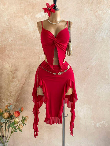 Elevate your summer wardrobe with this effortless two-piece set. The twist camisole features a flattering draped neckline that adds dimension and movement, while the asymmetric hem skirt creates a modern, fashion-forward silhouette.
