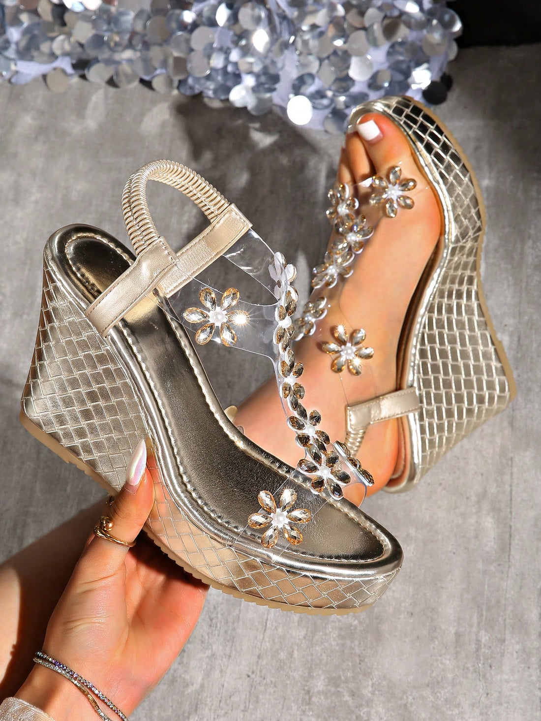 Step up your summer style game with these stylish and waterproof wedge sandals! Designed with comfort and fashion in mind, our open-toe platform will elevate any outfit. Perfect for a day at the beach or a night out, these sandals will keep you looking and feeling cool all season long.