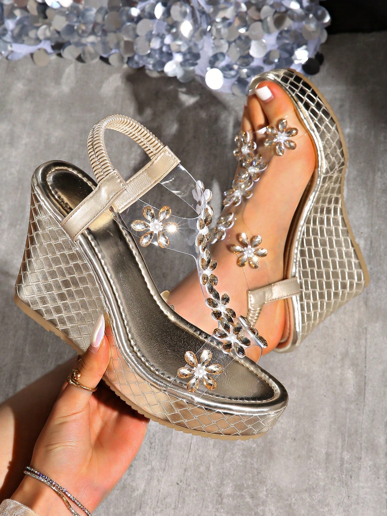 Step up your summer style game with these stylish and waterproof wedge sandals! Designed with comfort and fashion in mind, our open-toe platform will elevate any outfit. Perfect for a day at the beach or a night out, these sandals will keep you looking and feeling cool all season long.